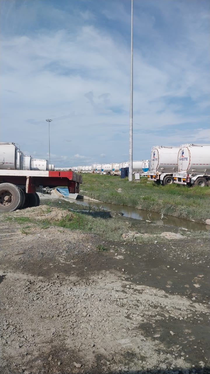 Home Fleet of Dangote tanker trucks parked in an industrial lot.